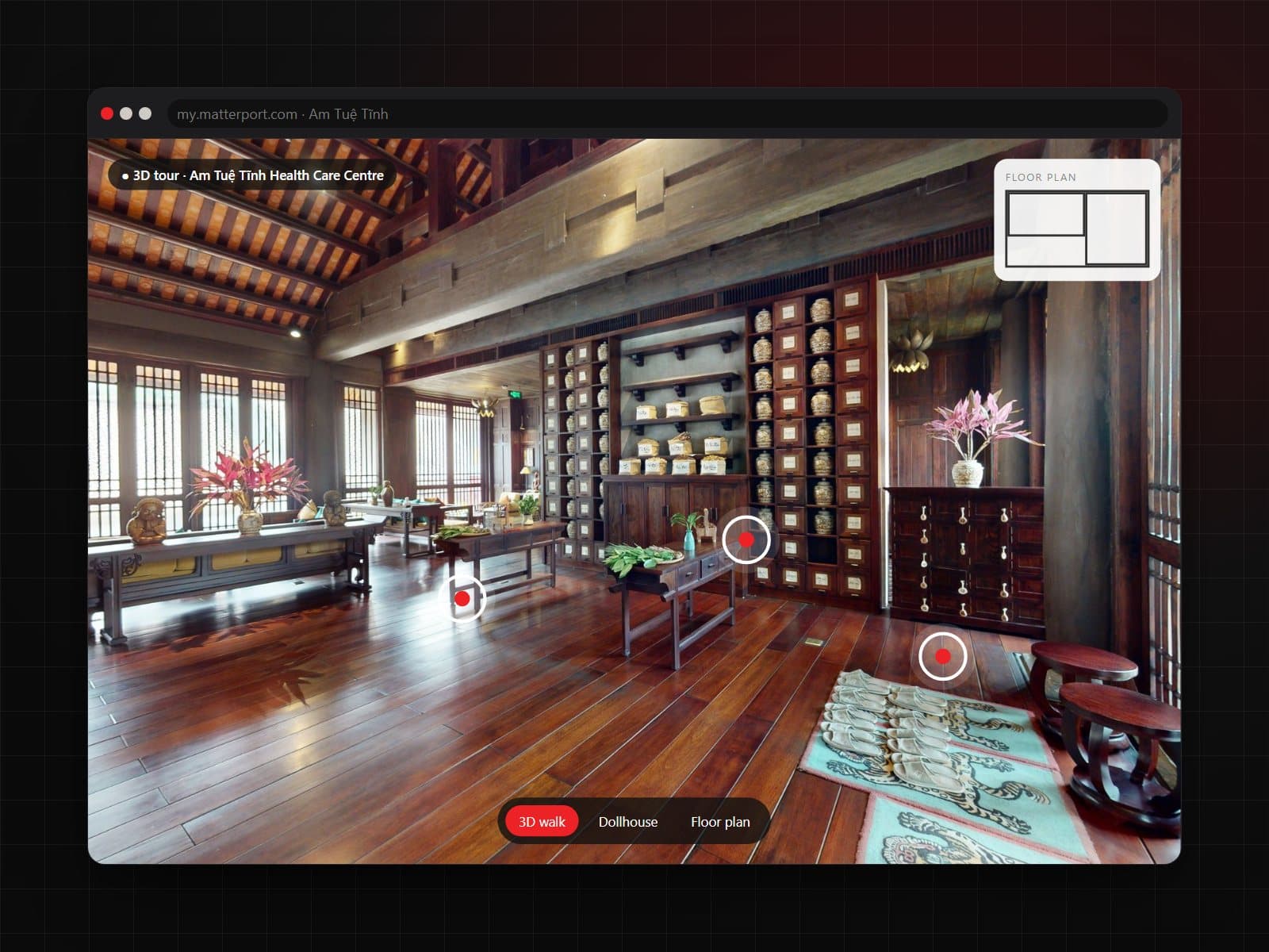 A 3D tour of the wooden hall of Am Tuệ Tĩnh Health Care Centre, shown in a browser with a floor plan.